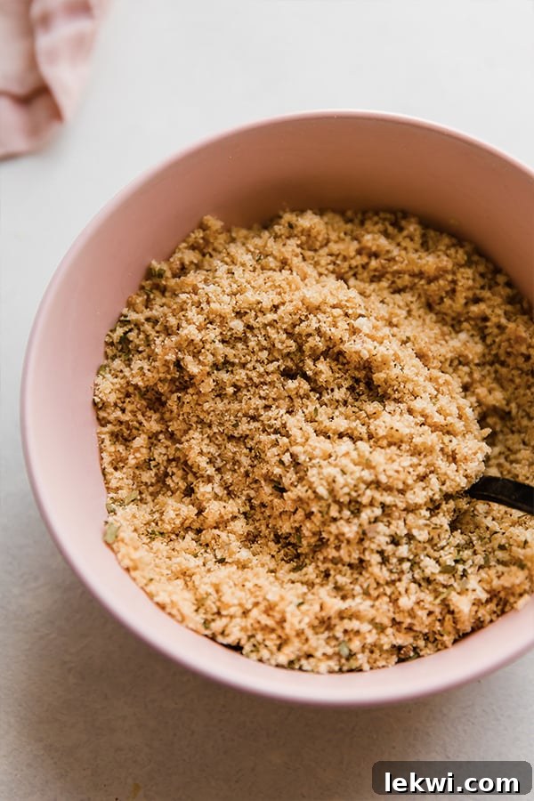 A bowl containing the seasoned pork panko chicken nugget coating, ready for dipping.