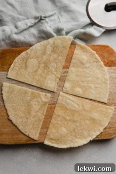 Tortilla cut into fourths.
