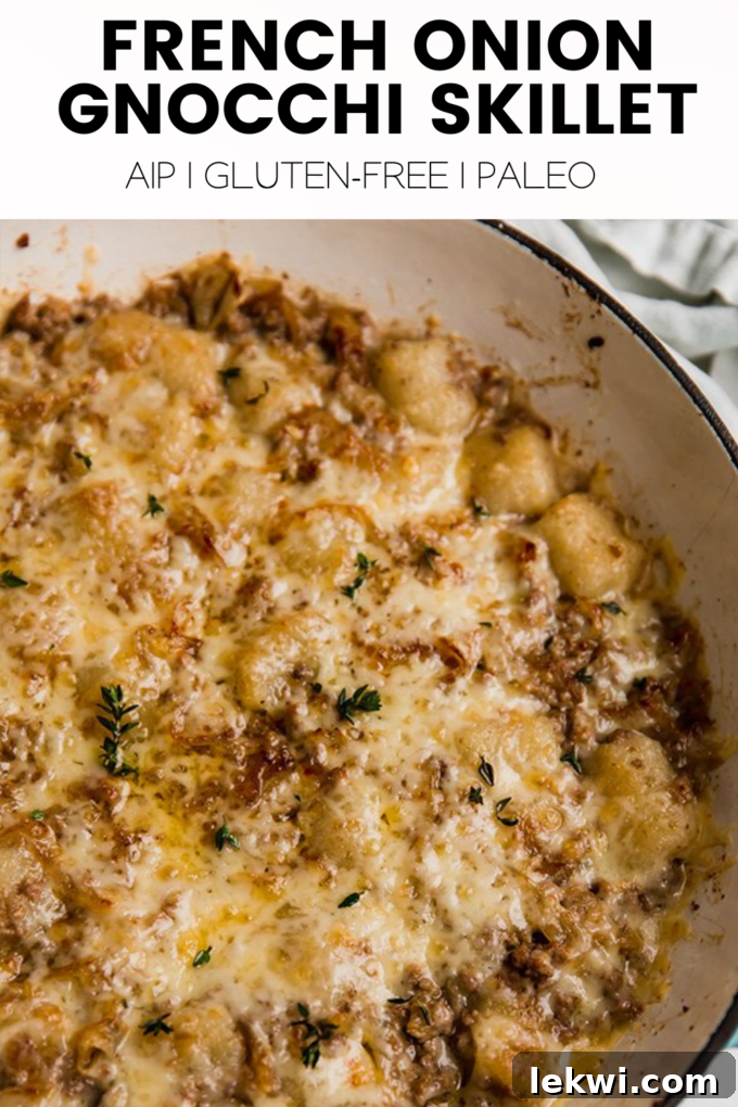Skillet with text "French Onion Gnocchi Skillet AIP | Gluten-Free | Paleo."