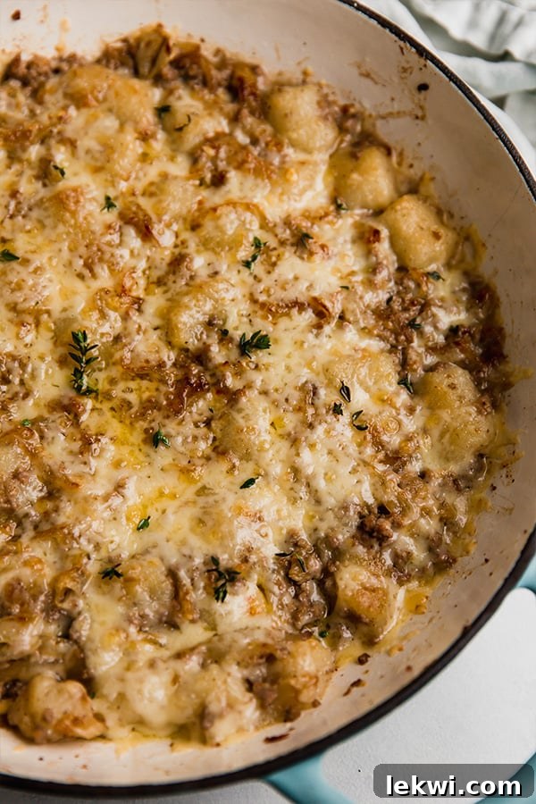 Skillet of French onion gnocchi.