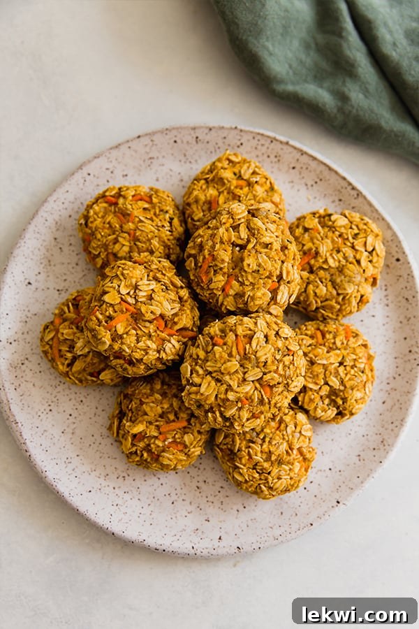 Applesauce carrot cookies piled on a plate.