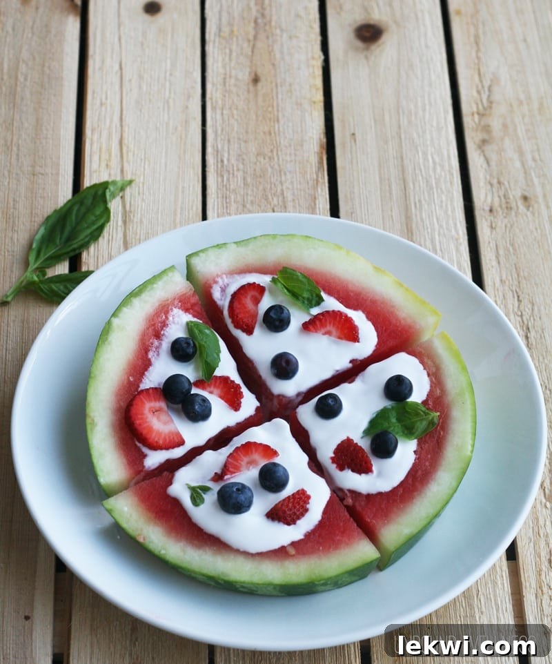 Colorful Red, White & Blue Watermelon Pizza with Fresh Basil