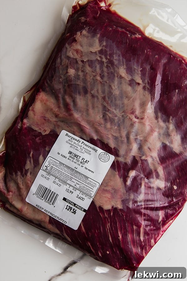A raw brisket flat, ready for seasoning and searing.