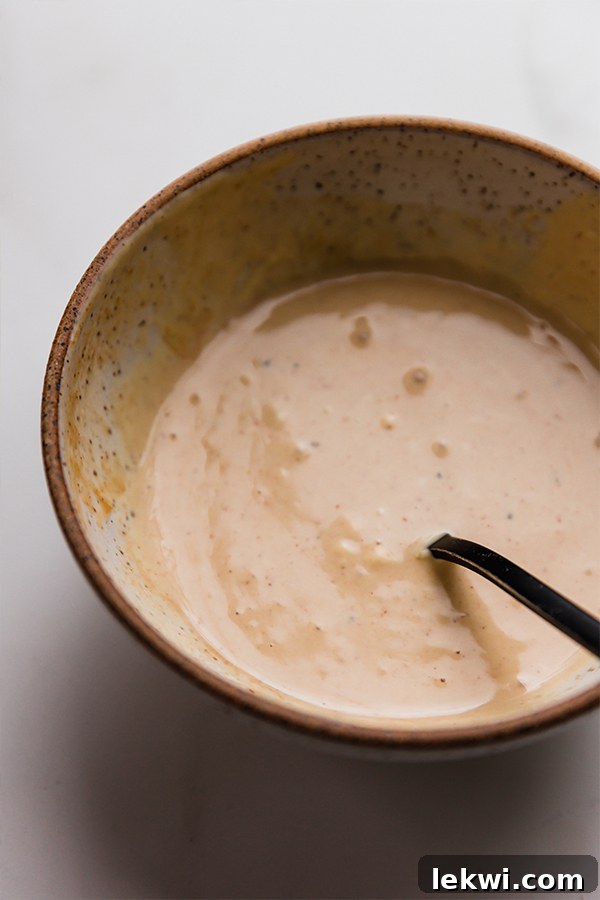 A small bowl of creamy, tangy, and sweet copycat Chick-Fil-A sauce.