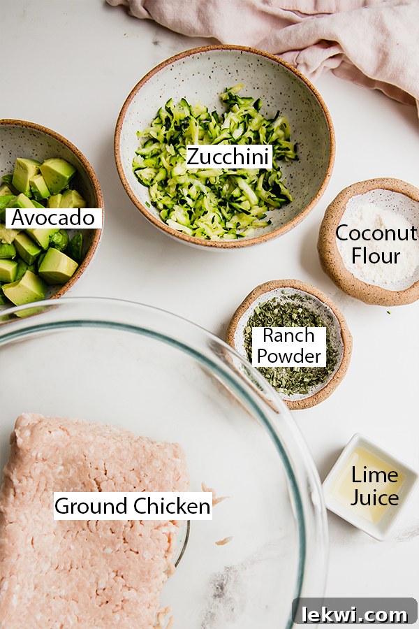 The ingredients for avocado ranch chicken burgers laid out on a table.