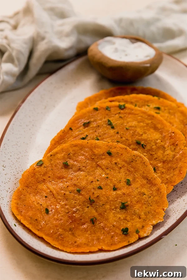 Beautifully arranged sweet potato flatbreads on a plate, ready to be enjoyed.