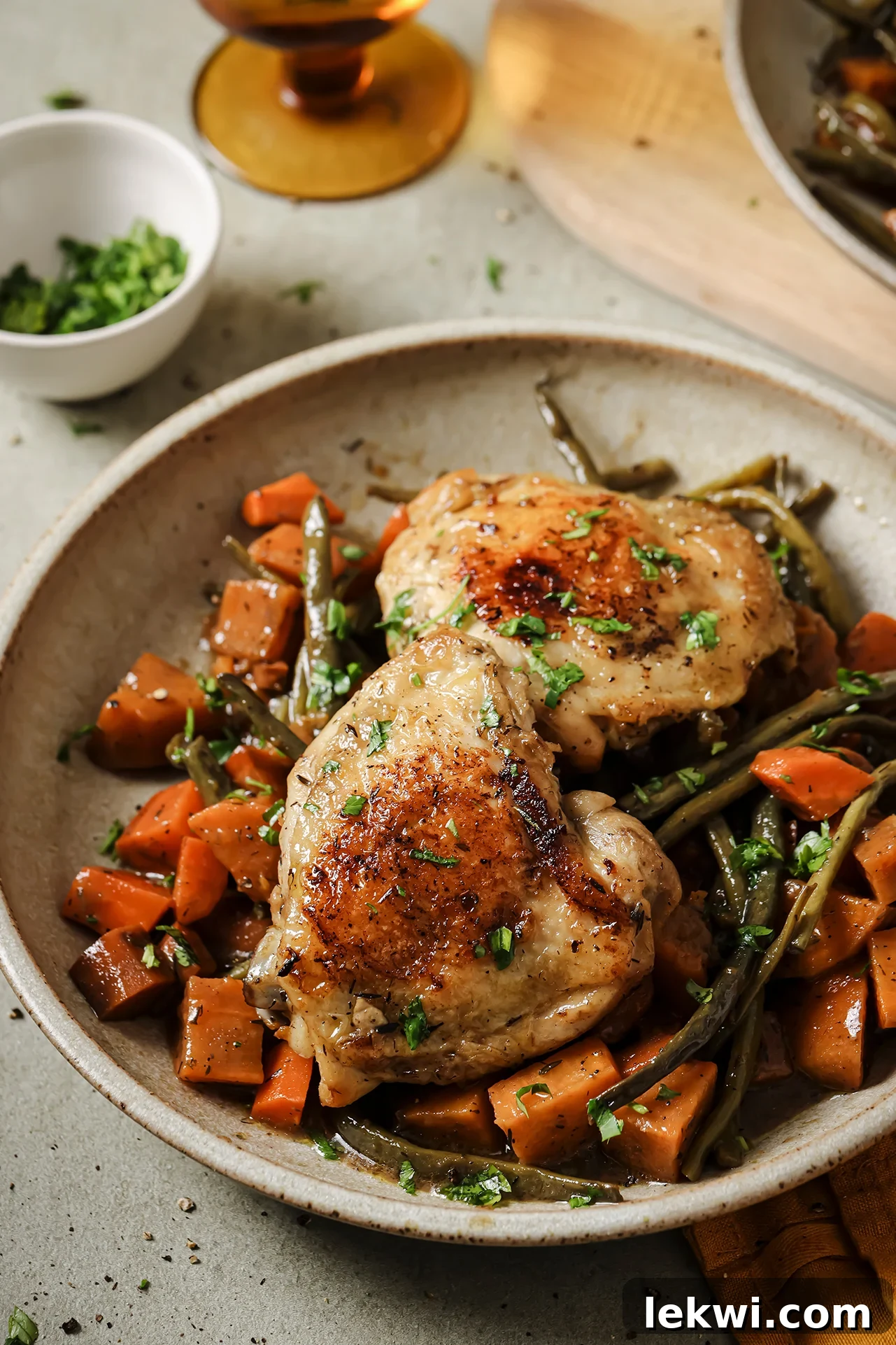 A serving of Slow Cooker Balsamic Chicken and Vegetables in a bowl, showcasing tender chicken and vibrant veggies.