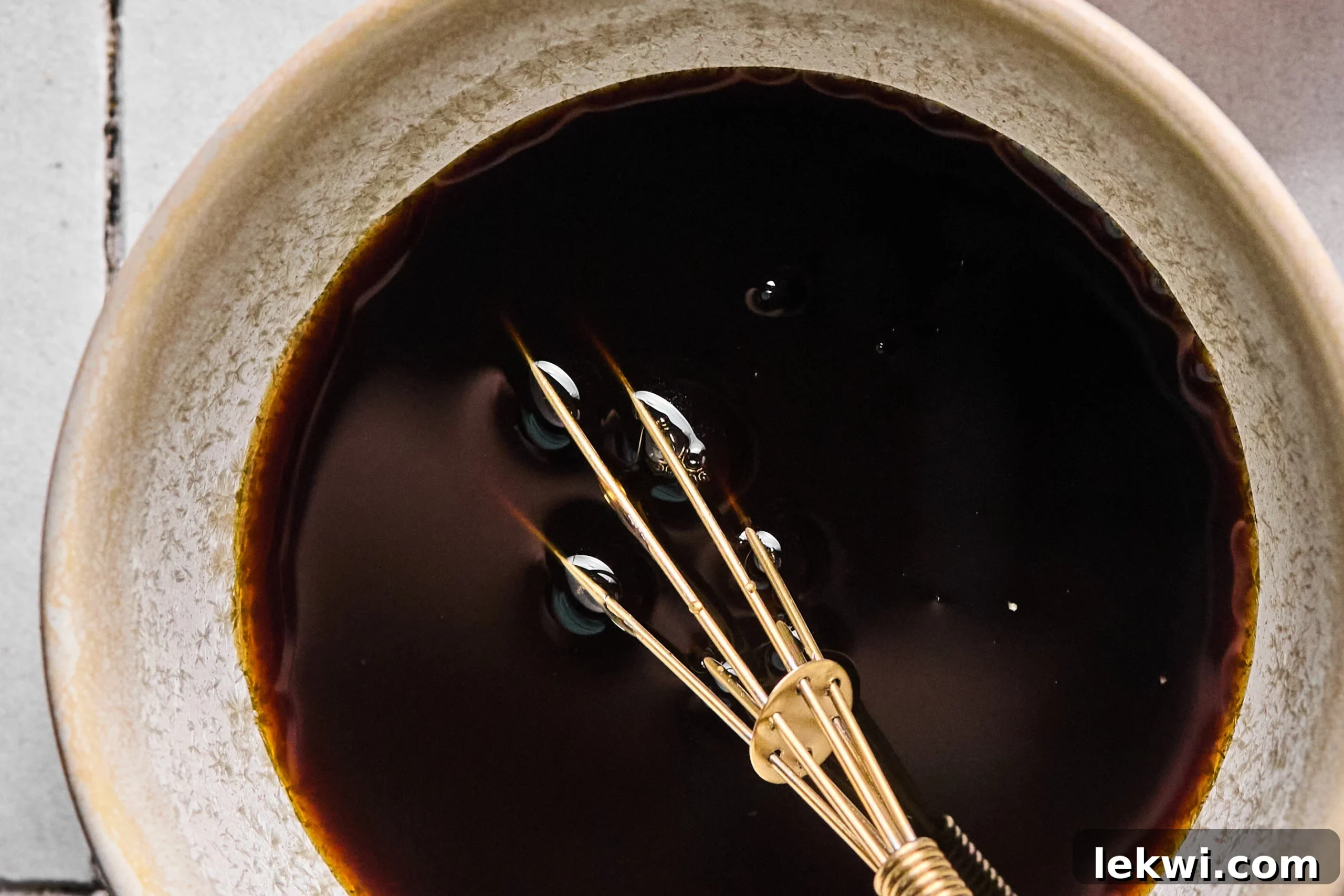 The stir fry sauce being made in a bowl.