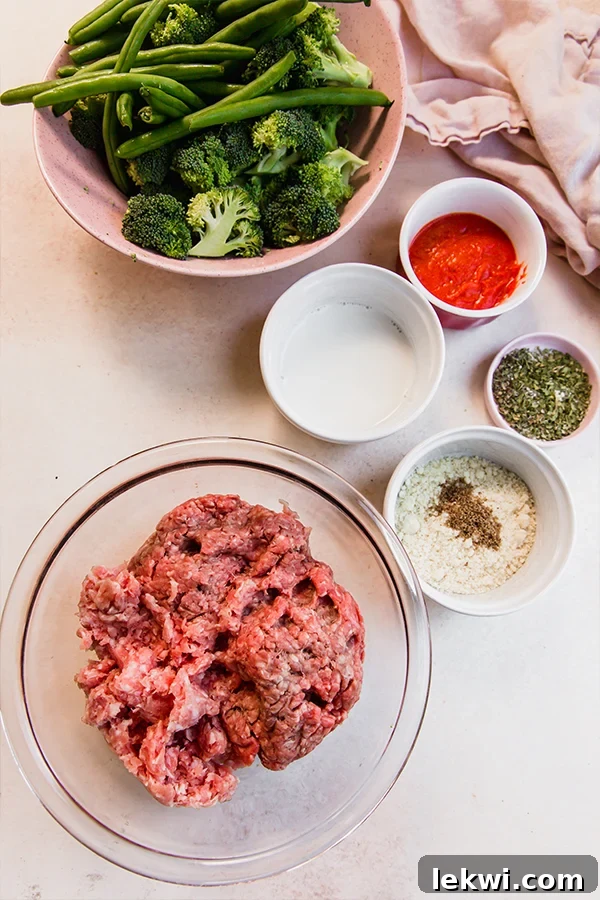The ingredients for Italian-Style Mini Meatloaf & Vegetable Sheet Pan.