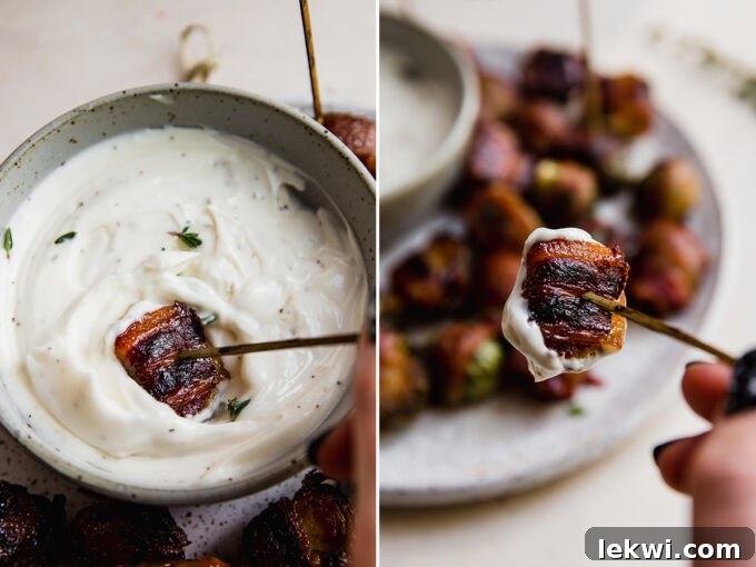 Bacon wrapped brussels sprouts dipping into sauce.