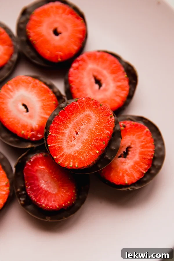 Chocolate strawberry crunch bites piled on a plate.