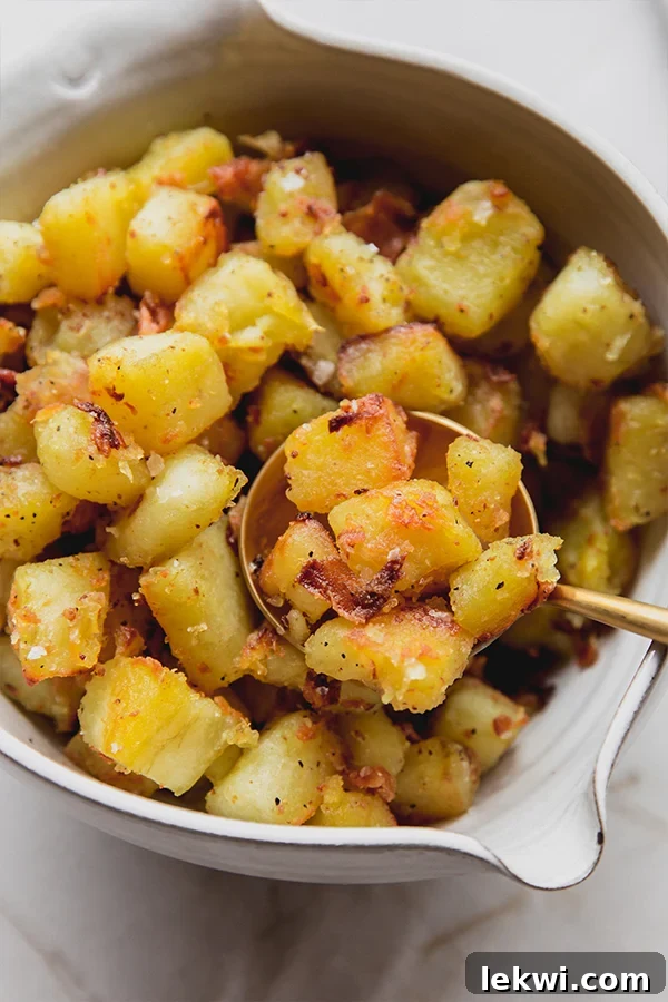 Crispy white sweet potato on a spoon.