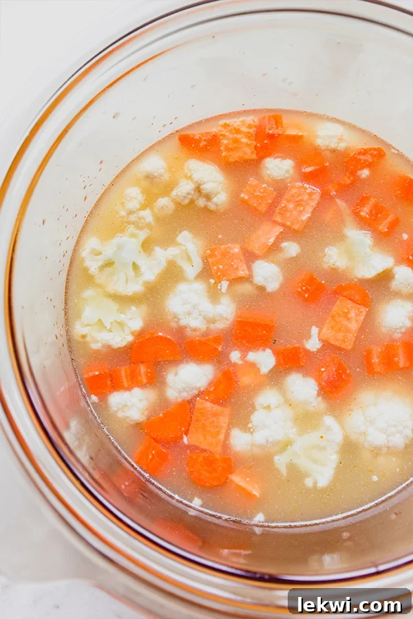Ingredients for golden chickpea soup laid out on a counter, ready for the slow cooker.