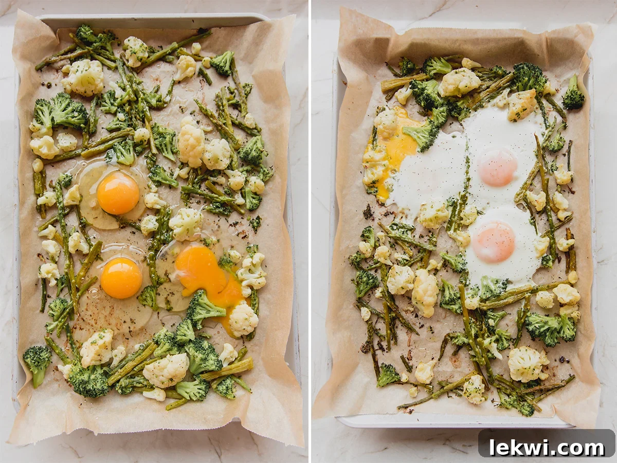 A sheet pan with roasted vegetables and several perfectly cooked eggs cracked directly onto the pan, forming a complete breakfast.