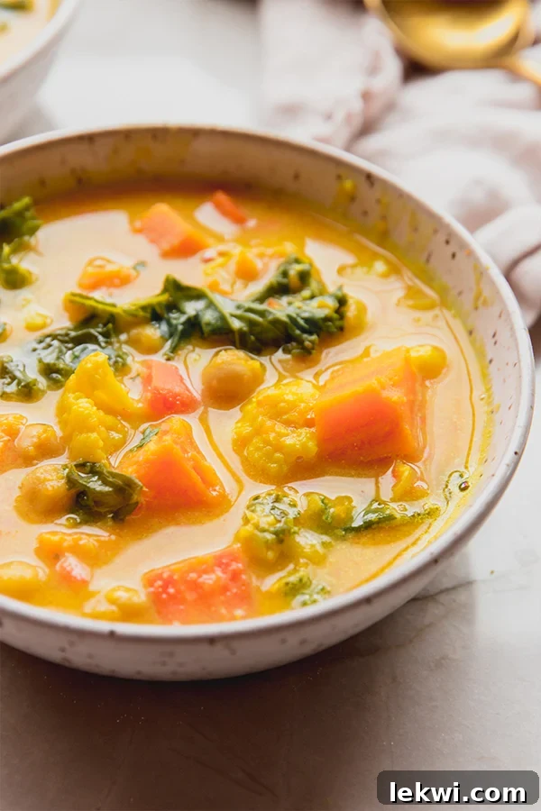 Bowl of bright chickpea soup.