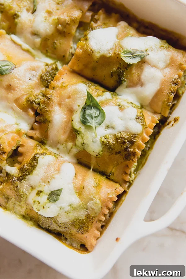 Baking dish of white pesto lasagna roll ups.