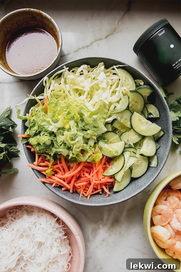 Sliced vegetables unmixed in a bowl.
