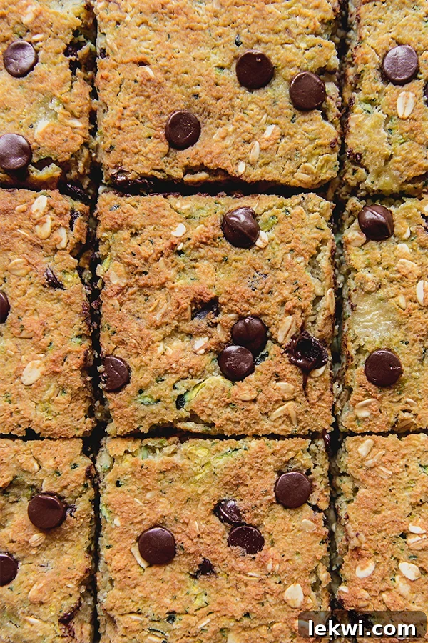 Zucchini banana breakfast bars cut into squares.
