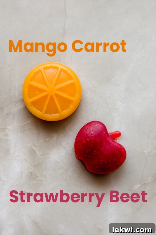 A mango carrot fruit snack next to a strawberry beet fruit snack.