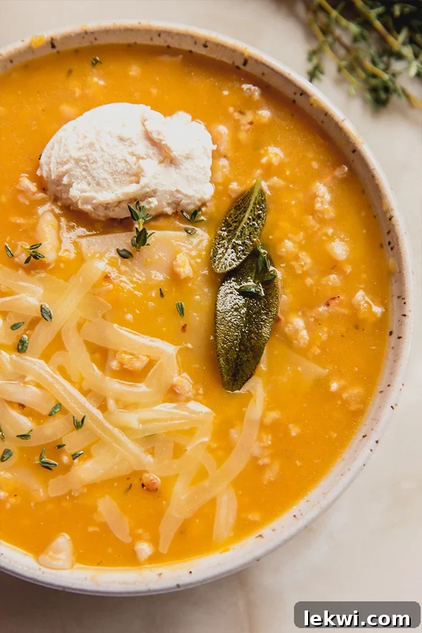 Sage leaves in a bowl of butternut lasagna soup.