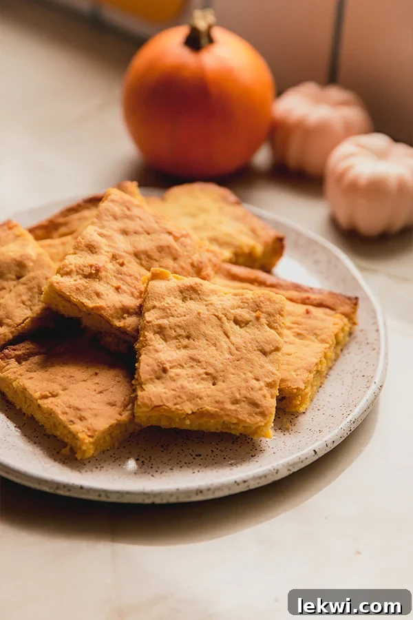 Plate stacked with "corn" bread.