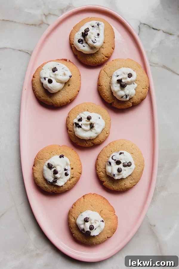 Pink platter of cannoli thumbprint cookies.