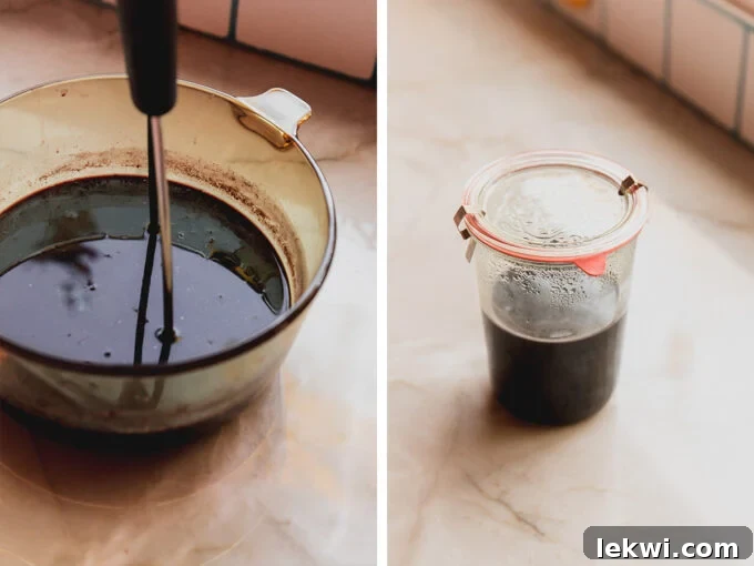 A bowl of the homemade elderberry syrup being mixed and put into jar.