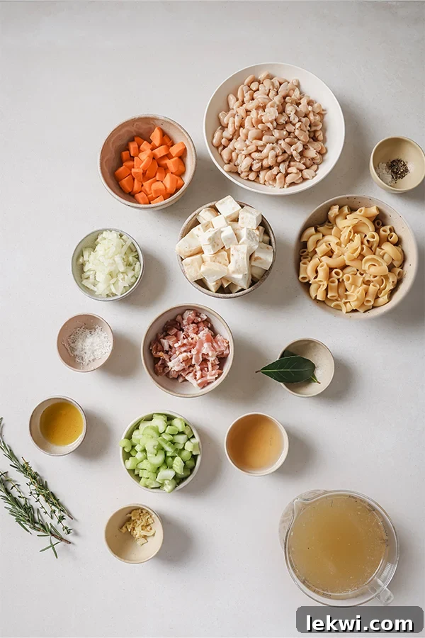 All the ingredients to make white pasta fagioli soup.