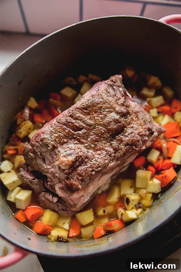 The apple cider braised pot roast before baking.
