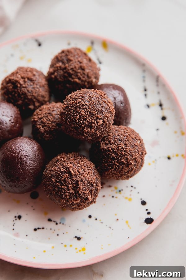 Thin mint truffles in a pile on a plate.