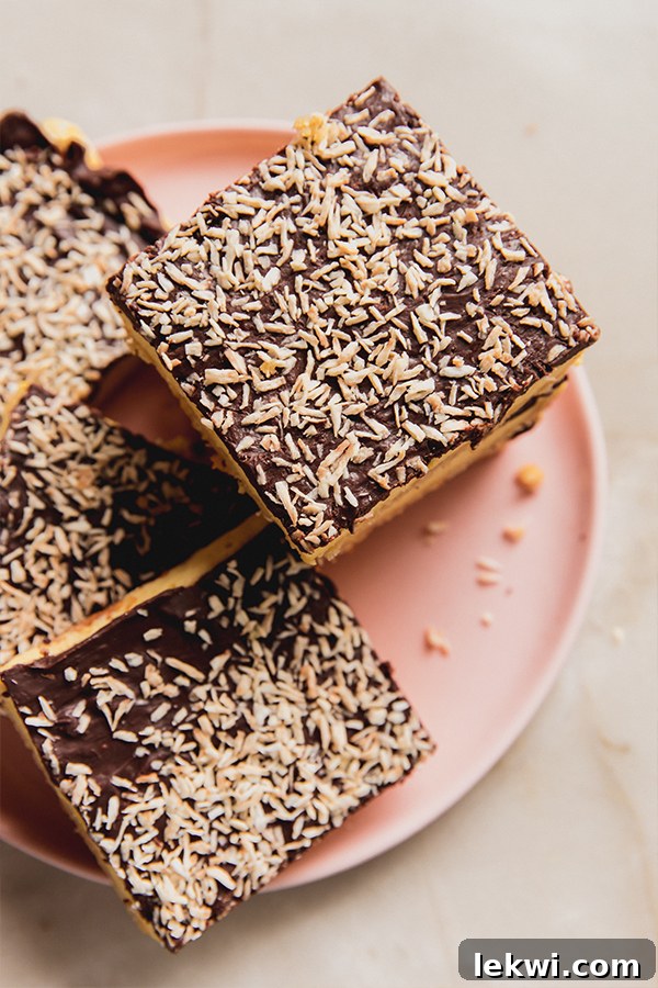 A plate of lemon coconut s'mores bars stacked ready to be enjoyed. 
