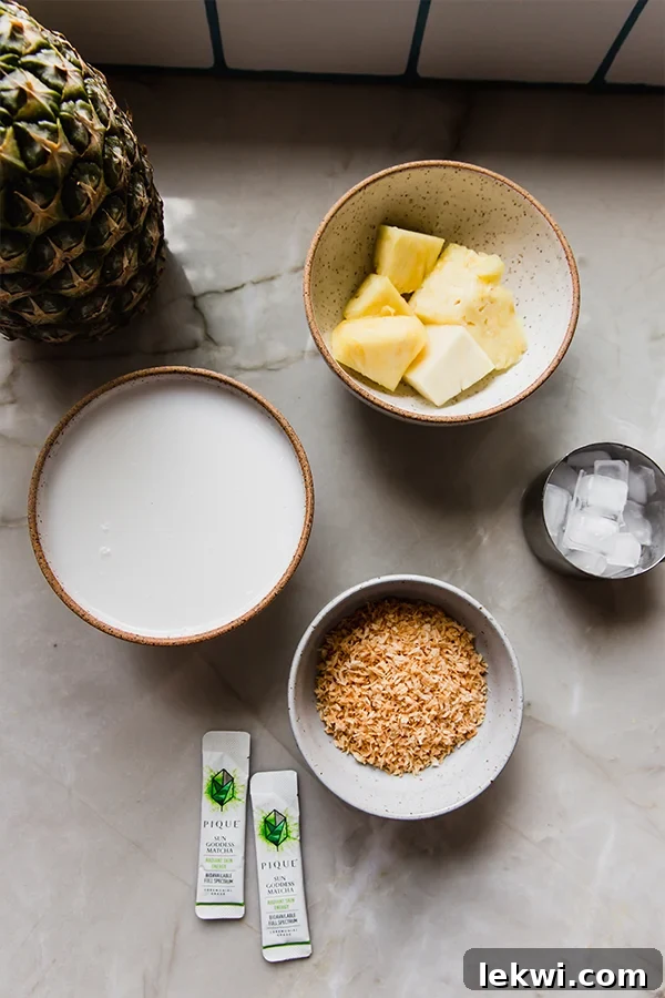 Two matcha pina colada ingredients in separate bowls. 