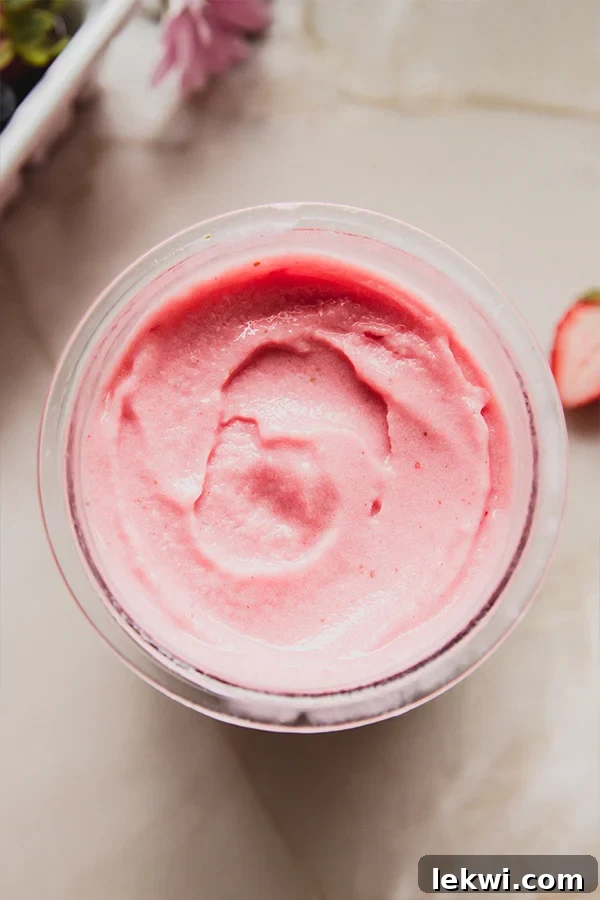 The Strawberry Pink Drink Sorbet, fully blended and smooth, ready to be served directly from the Ninja Creami container.