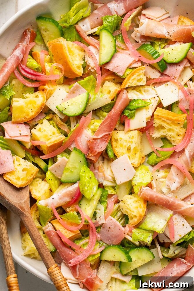 A close up photo of the finished sub in a tub salad, showcasing fresh ingredients and vibrant colors.