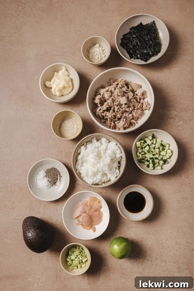 Avocado tuna rice bowl ingredients in separate bowls.