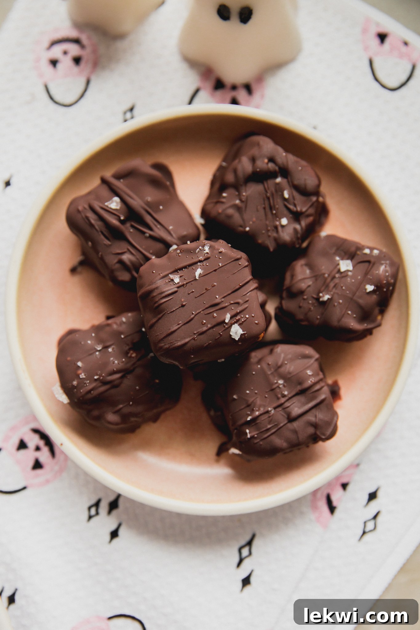 Copycat butterfinger minis on a pink plate, ready to be enjoyed.