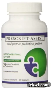 A glass of Probiotic Ginger Beet Kvass, a fermented drink, next to some root vegetables.