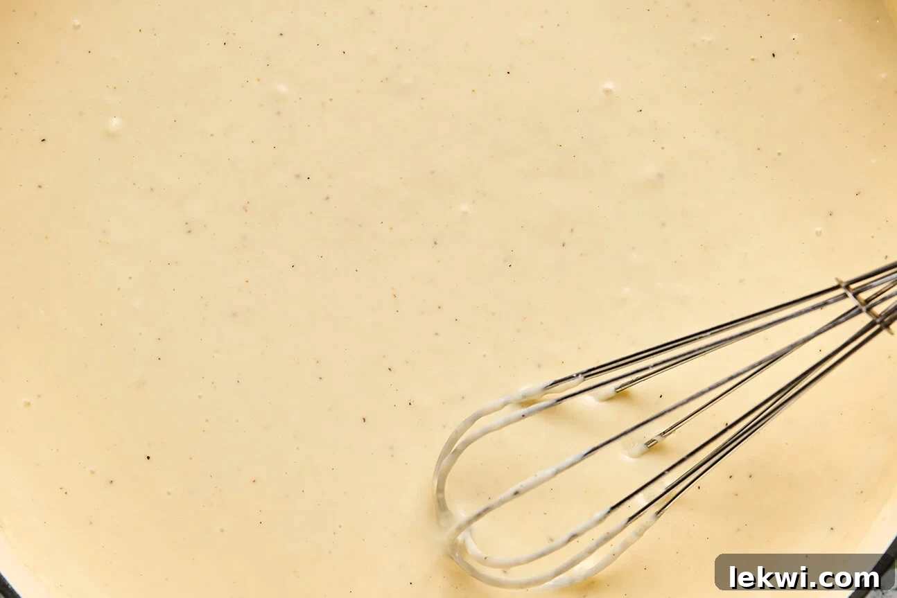 A totally smooth sauce with all the cheese melted in.