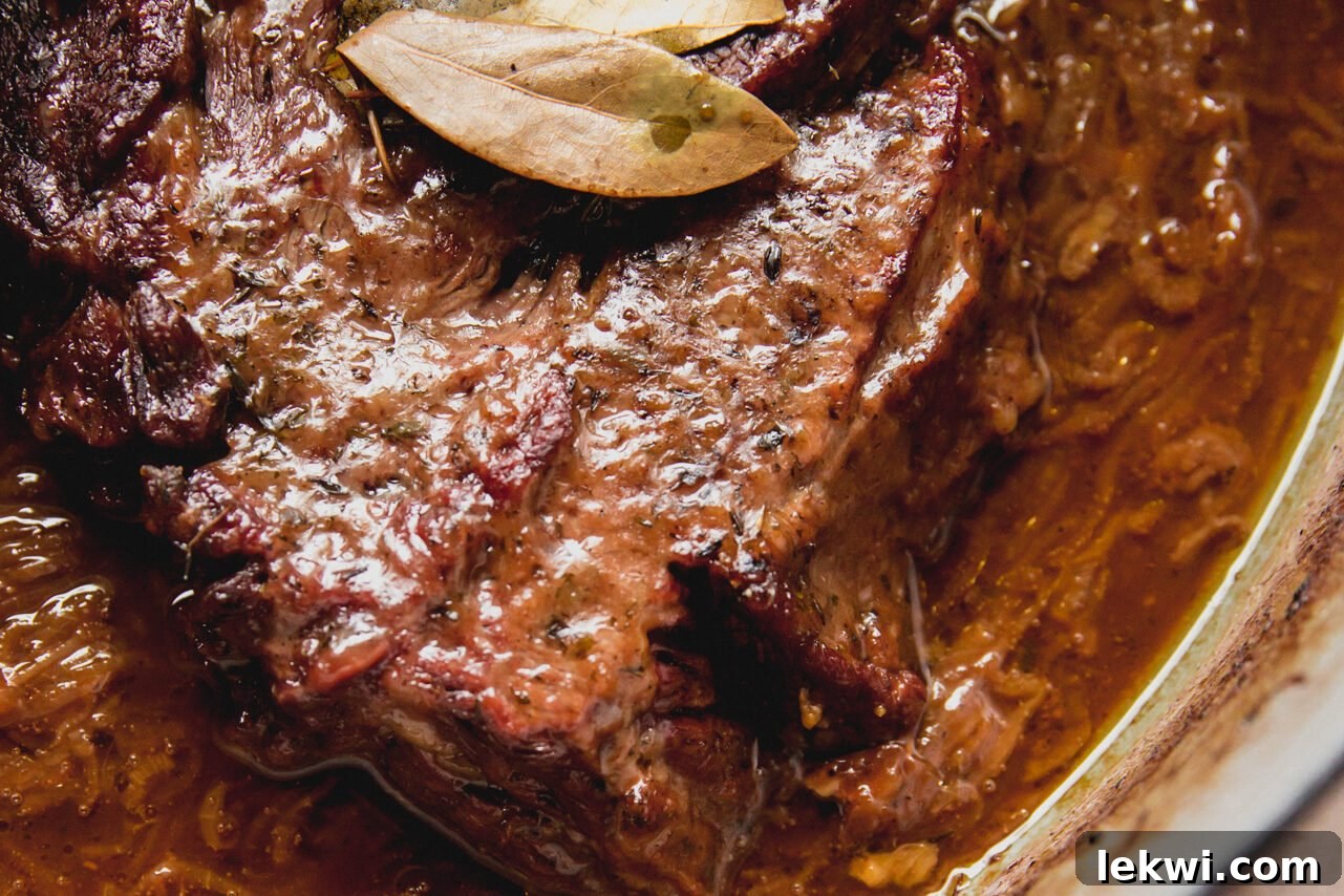 The pot roast after cooked in the oven.