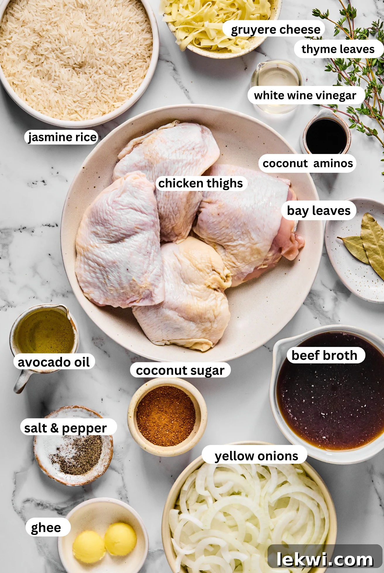 All of the ingredients for French onion chicken and rice laid out on a table.