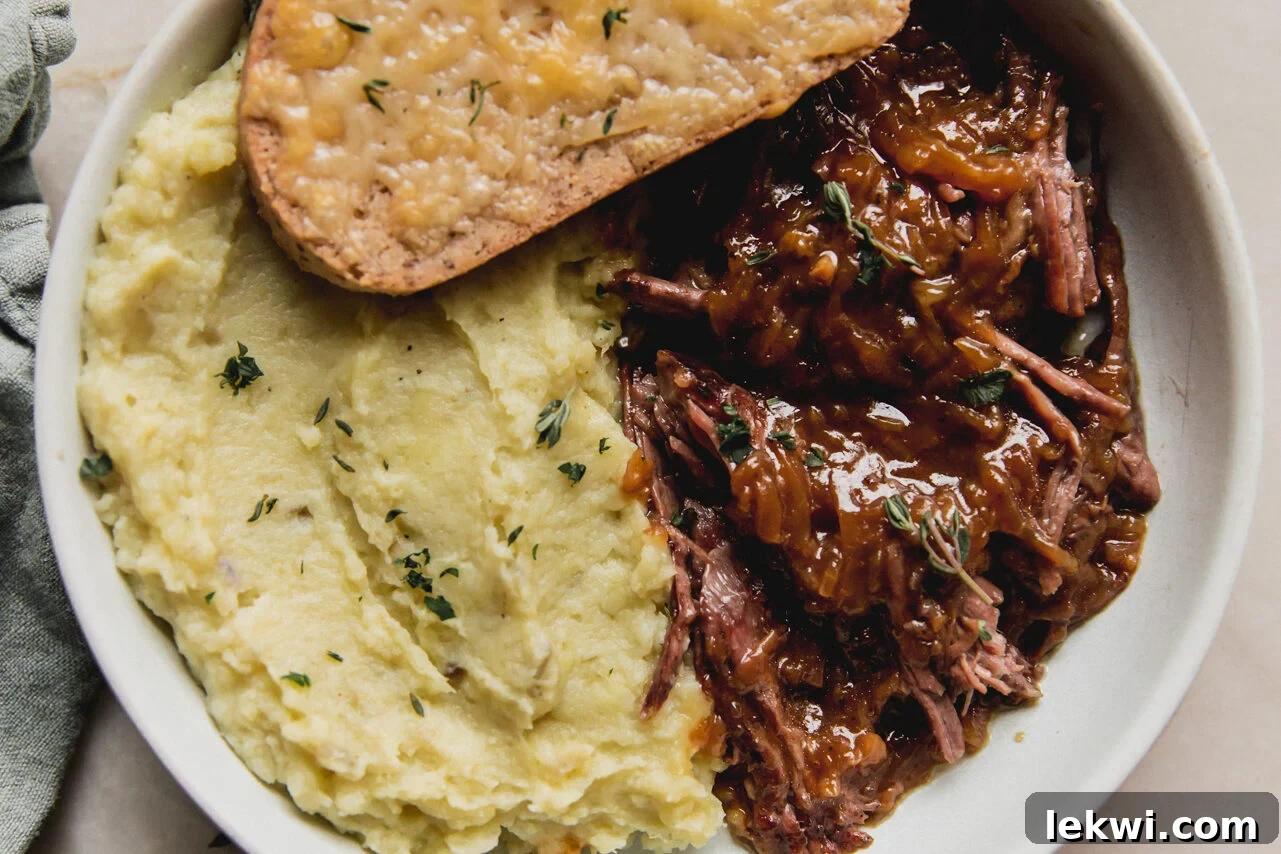 Savory French Onion Pot Roast served with mashed sweet potato and cheese toast.