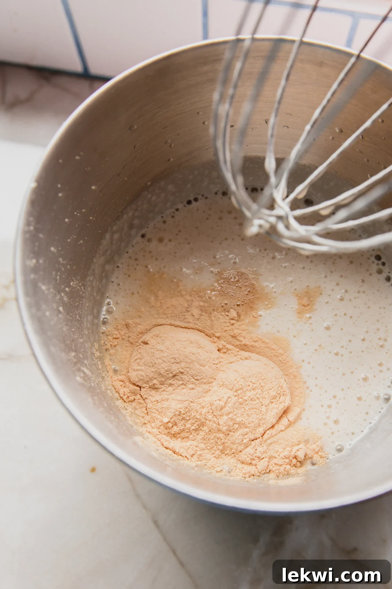 almond milk, gelatin, and cane sugar combined in a bowl
