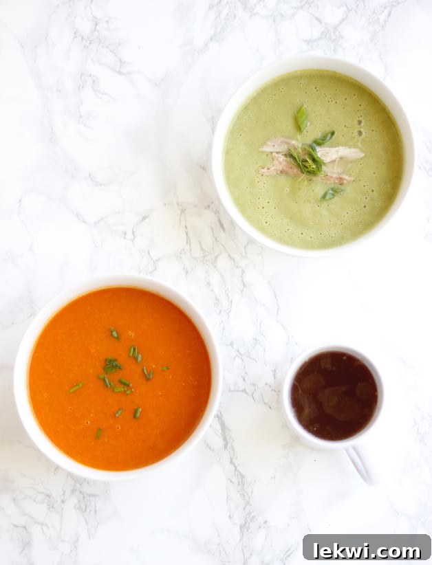 Two bowls of soups and a mug of bone broth sitting out on a counter.
