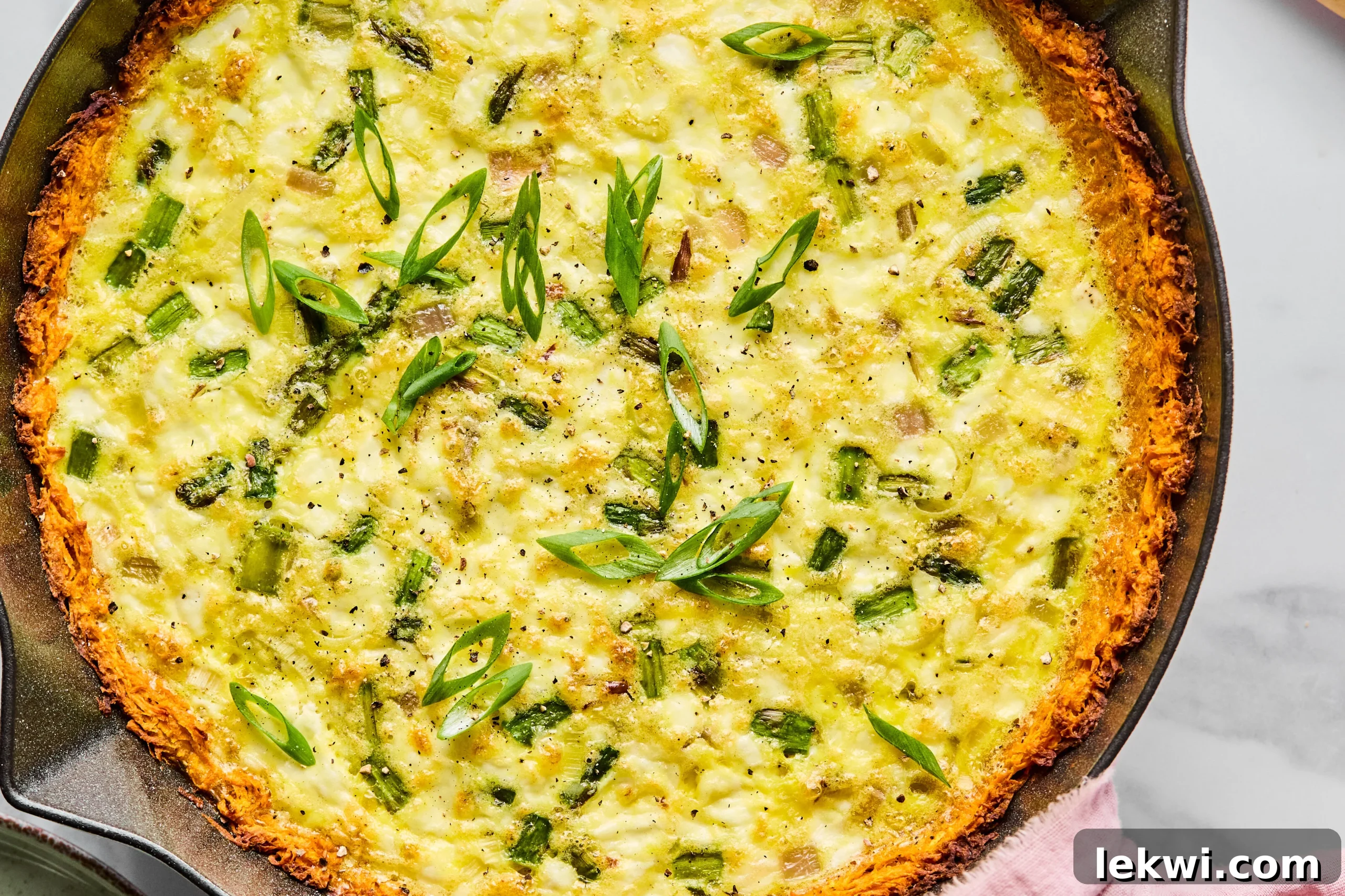 The fully baked sweet potato quiche, golden brown and perfectly set.