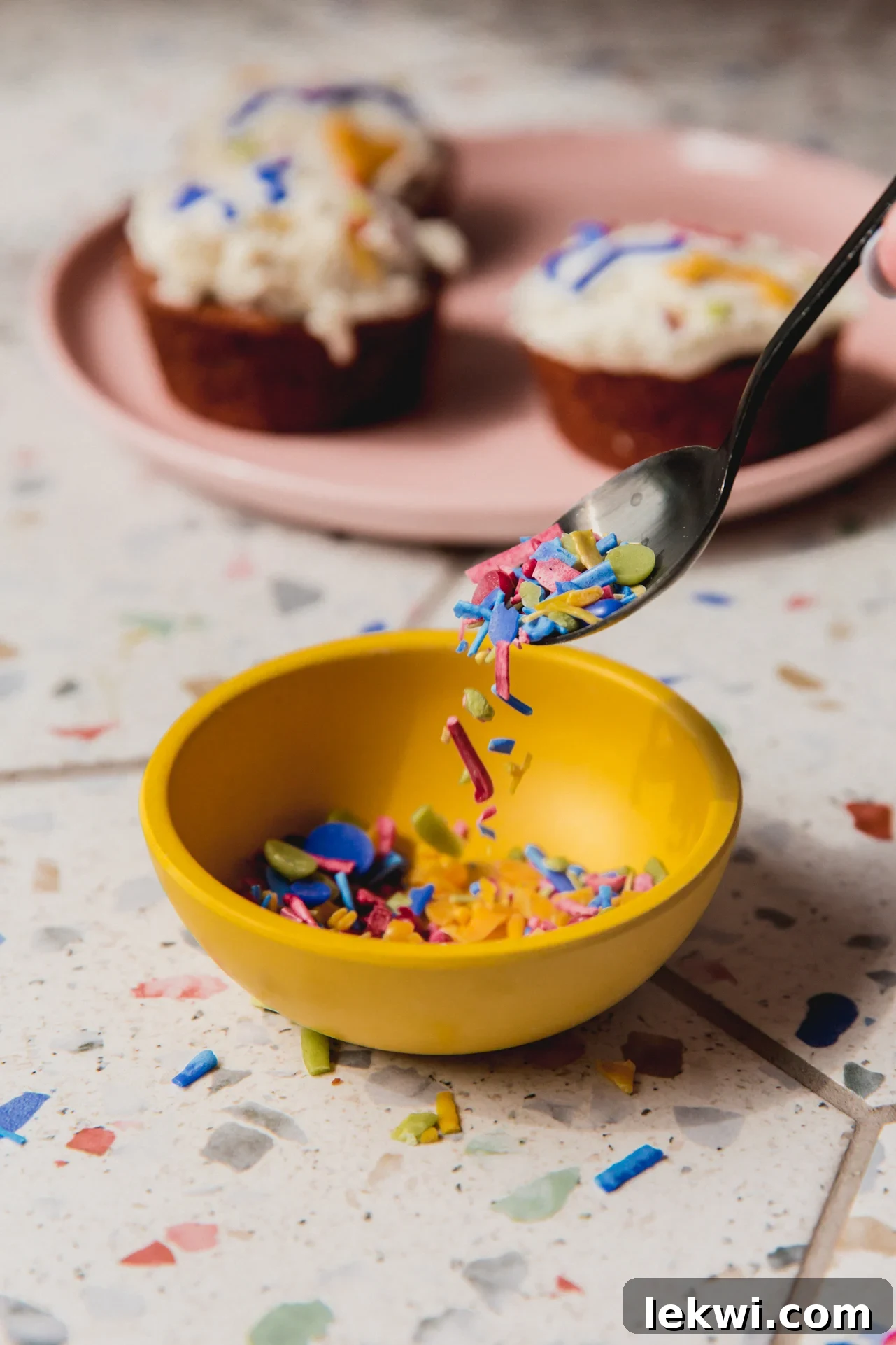Vibrant homemade sprinkles in a yellow bowl, ready for baking adventures.