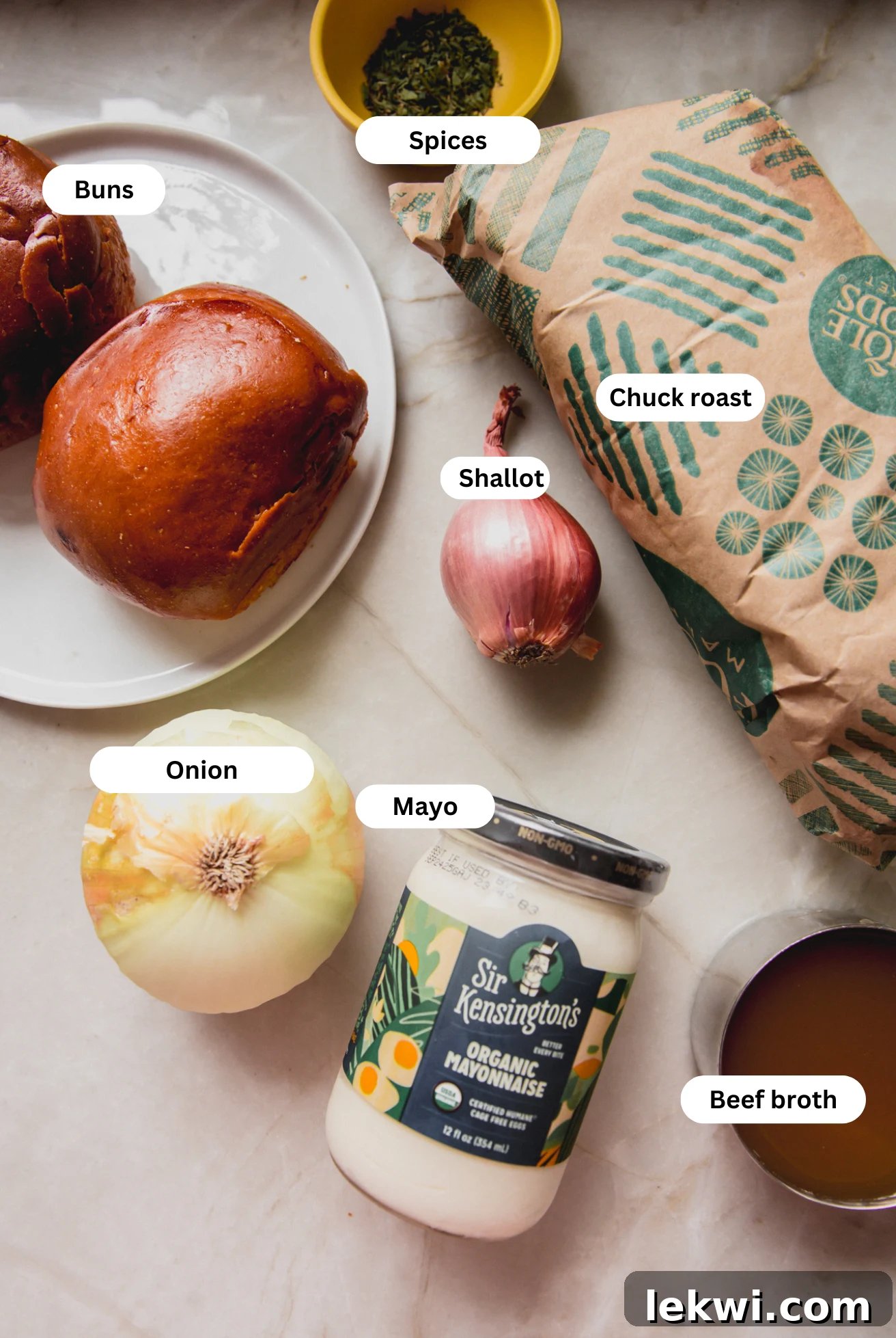 All the fresh ingredients meticulously laid out, ready to be used to make delicious pot roast sandwiches.