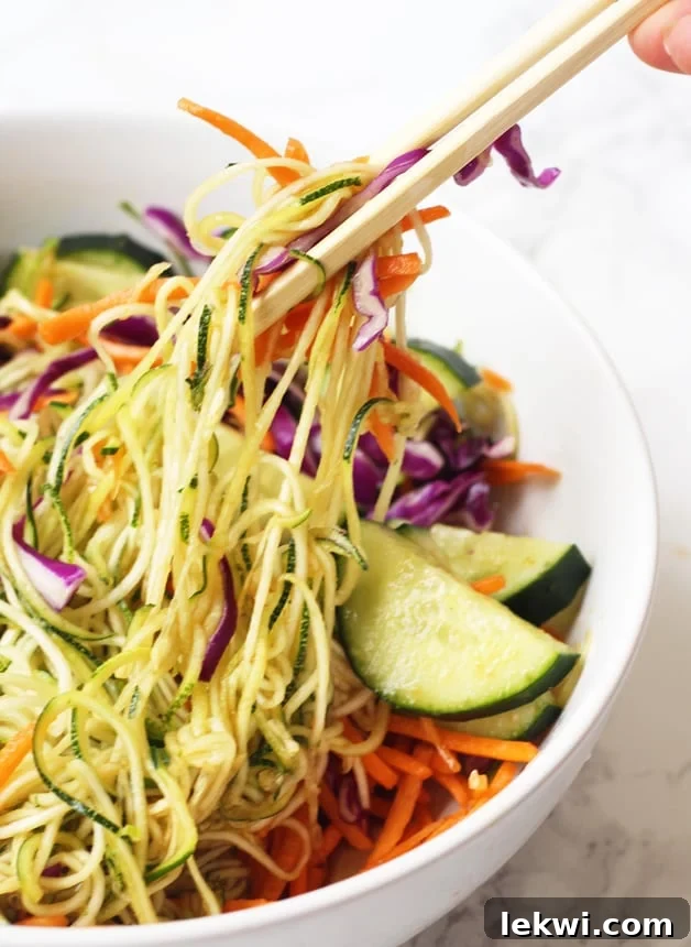Delicious and Healthy Asian Zucchini Noodle Bowl (Paleo, AIP, Whole 30) - A vibrant, gluten-free and soy-free meal option.