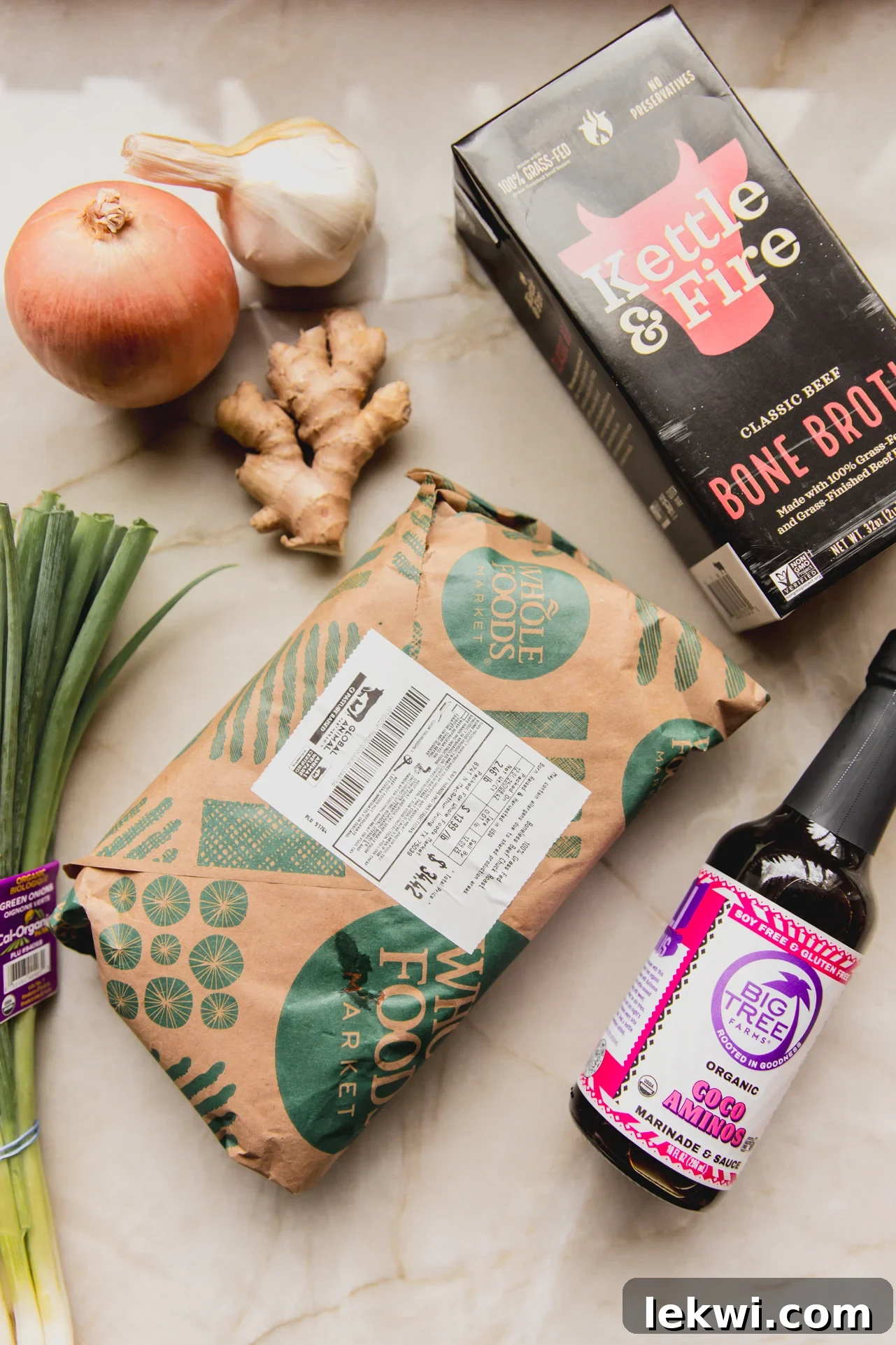 Ginger chuck roast ingredients laid out on a marble counter top.