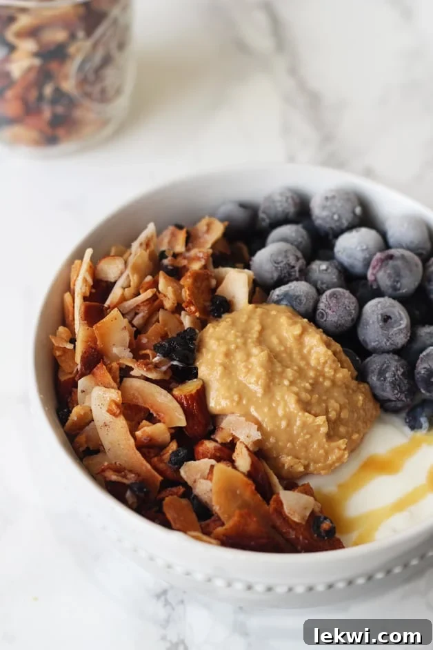 Delicious Grain Free Blueberry Coconut Granola in a bowl, perfect for Paleo & AIP diets