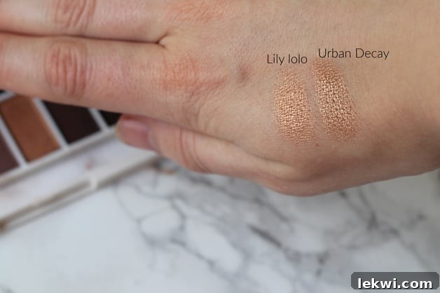 A hand with different makeup colors rubbed on it.